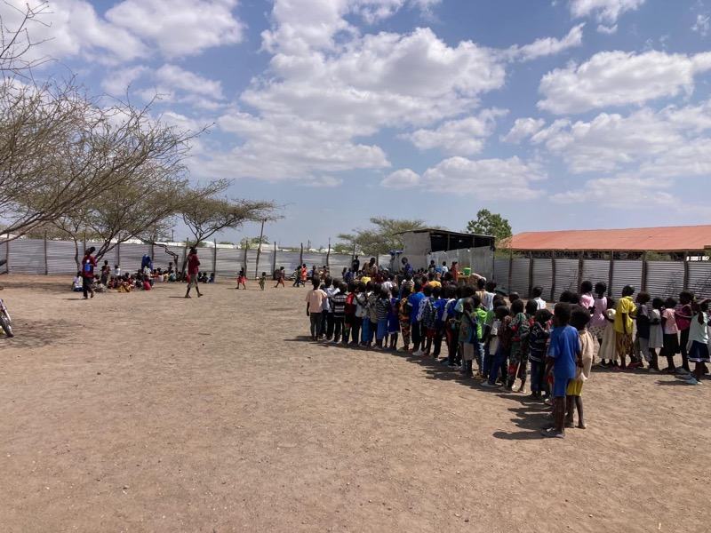Children lined up in the school yard at TNCH